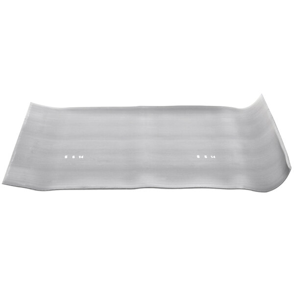 A grey Cactus Mat Tredlite anti-fatigue mat with a curved edge.