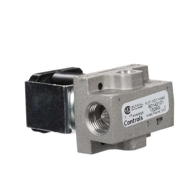 A close-up of a Montague pilot solenoid valve with a black metal housing.