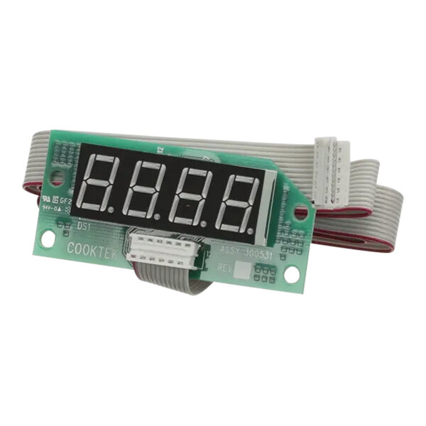 A green CookTek PCB with white numbers on a digital display.