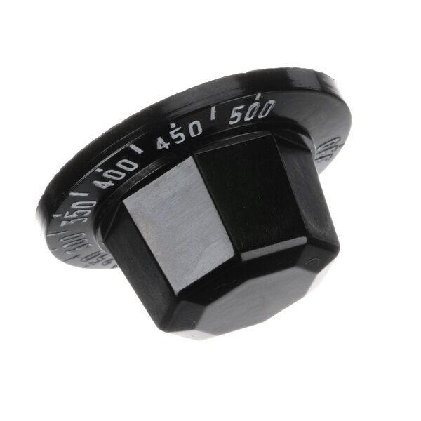 a black plastic knob with white text