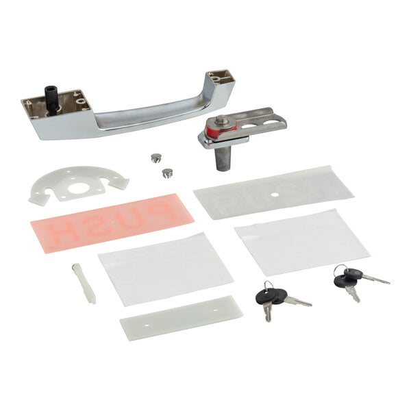 A set of metal and plastic hardware components, including a handle, keys, and various mounting pieces, laid out on a white surface.