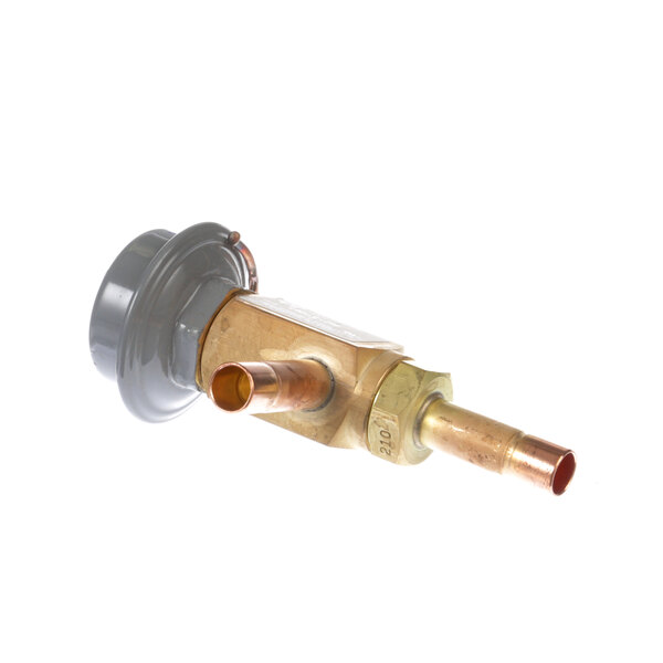 A copper pipe with a valve on it connected to a gas regulator.