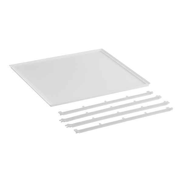 A white rectangular ceramic tray with four white plastic strips.