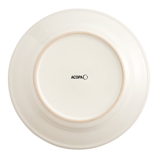 An Acopa ivory stoneware plate with a wide rim.