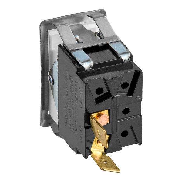 A white Blodgett electrical rocker switch with black and gold terminals.