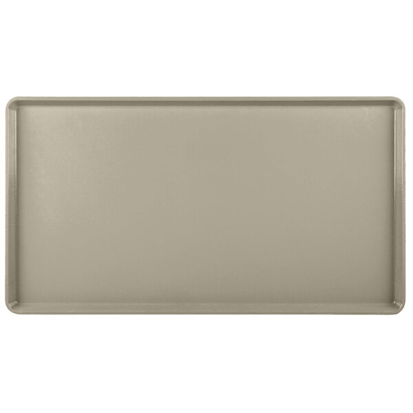 A rectangular desert tan tray.