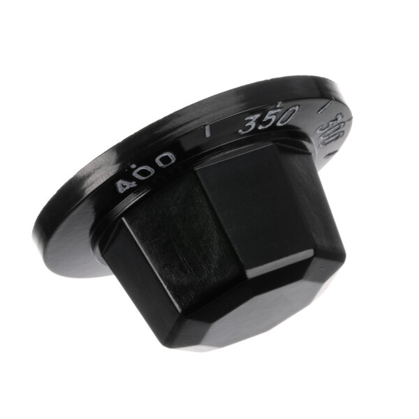 A close-up of a black Jade Range knob with a hexagon shape.