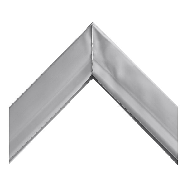 A close-up of a Traulsen refrigeration gasket corner with a metal bar.