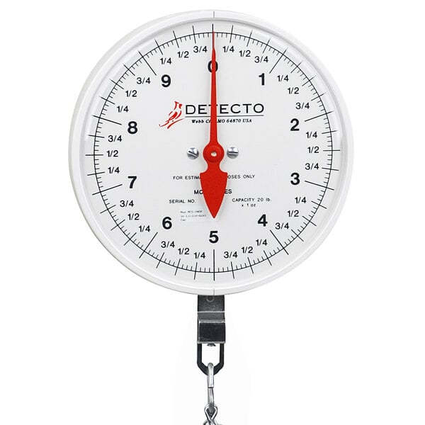 a white dial with red hands