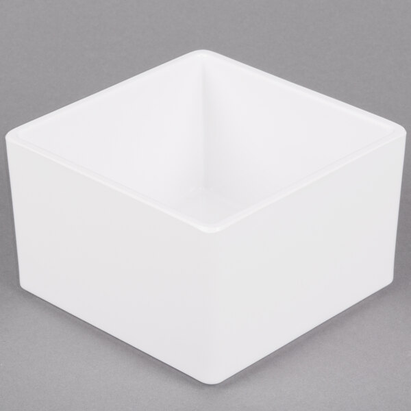 A white square Cal-Mil melamine box.