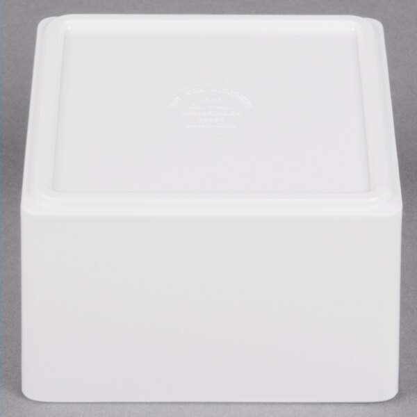 A white rectangular melamine box with a lid.