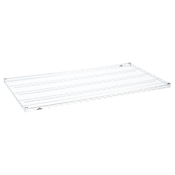 A white wire shelf with metal rods.