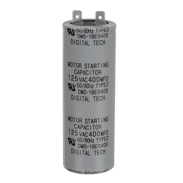 A close-up of a white Turbo Air Refrigeration capacitor with the words "motor start" on it.