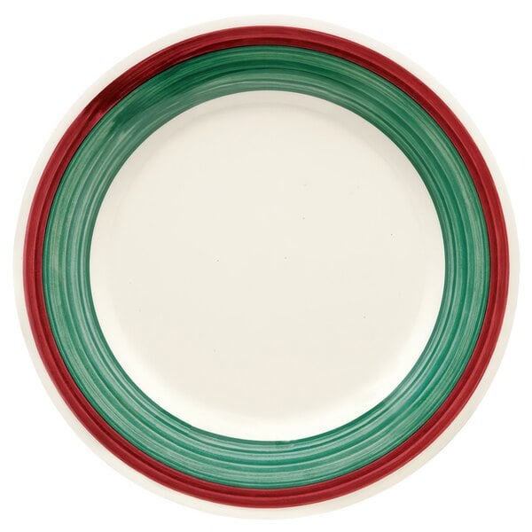 A white plate with a red and green striped border.