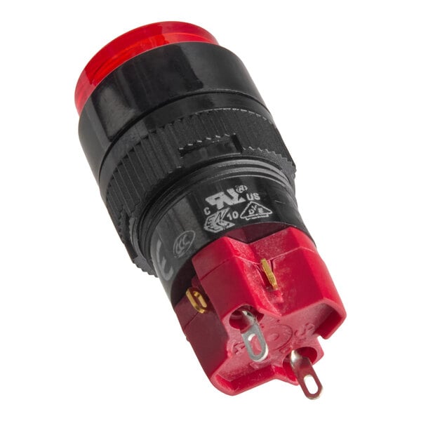 A close-up view of a red and black electrical push button switch with metal terminals and certification markings.