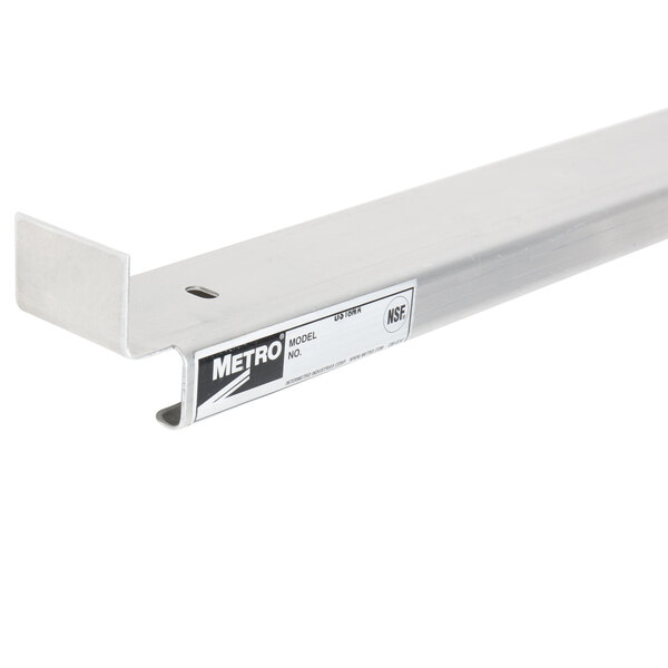 A metal bar with a white label.
