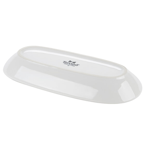 A white rectangular Tuxton china relish tray.