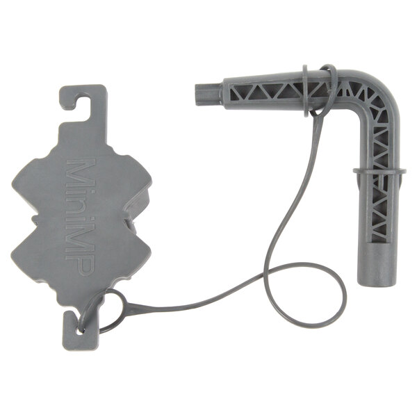 A grey plastic Robot Coupe blade assembly tool with a wire attached to it.