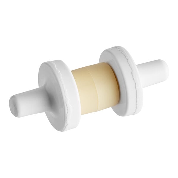A white plastic Manitowoc Ice damper magnet with yellow tape inside