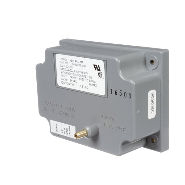 A grey Baxter ignition control with a white label.