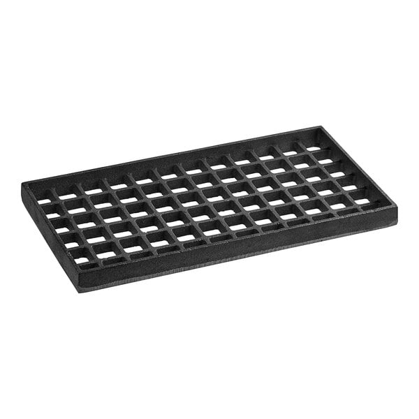 A black plastic grate with holes.