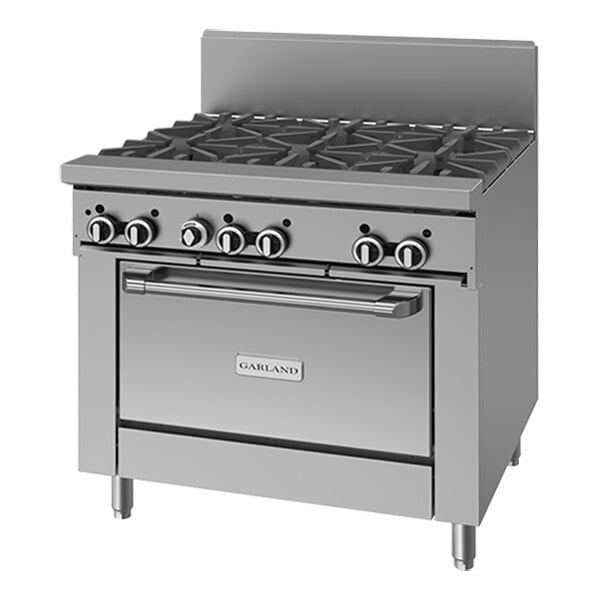 A commercial stainless steel 6-burner gas range with an oven and flame failure protection.