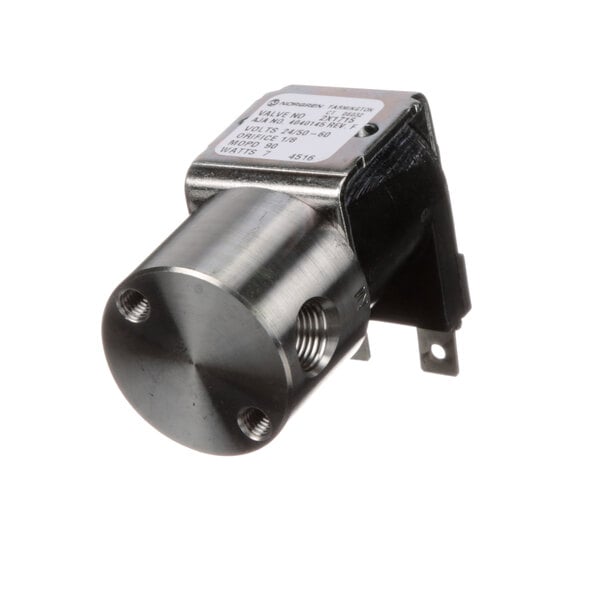 A close-up of a small metal Antunes solenoid valve with a white label.