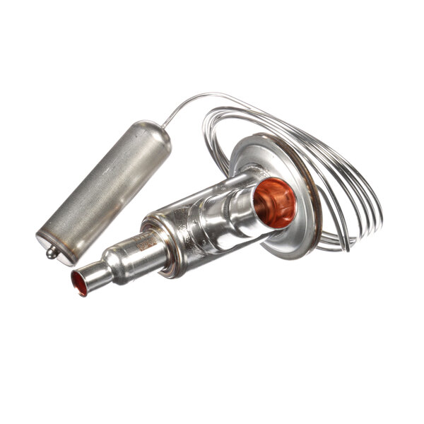 A close-up of a Manitowoc Ice expansion valve with copper and silver wires and a small orange bulb.