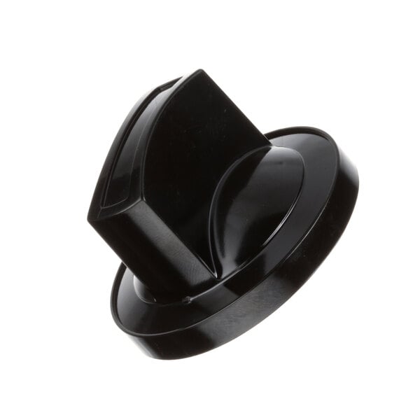 A close-up of a black plastic Garland open burner knob.