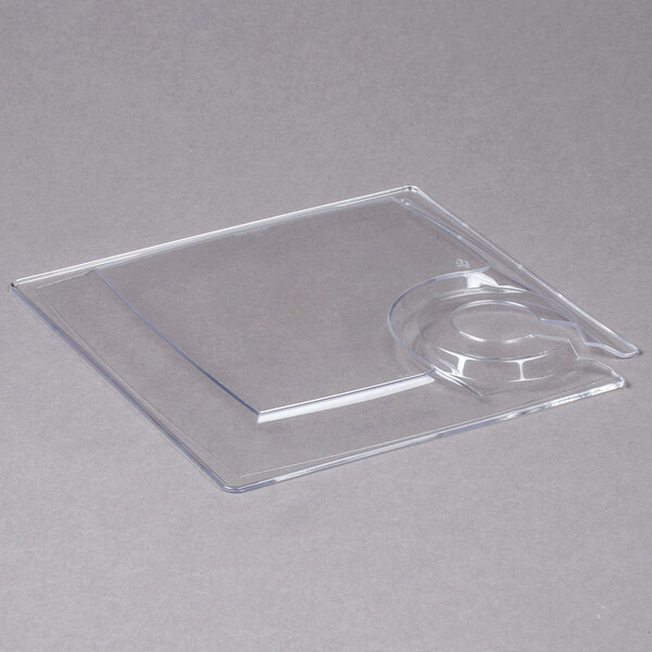 A clear plastic square plate with cup holder inserts.