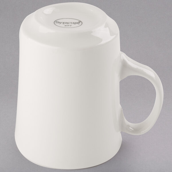 A Libbey ivory porcelain cafe mug with a handle.