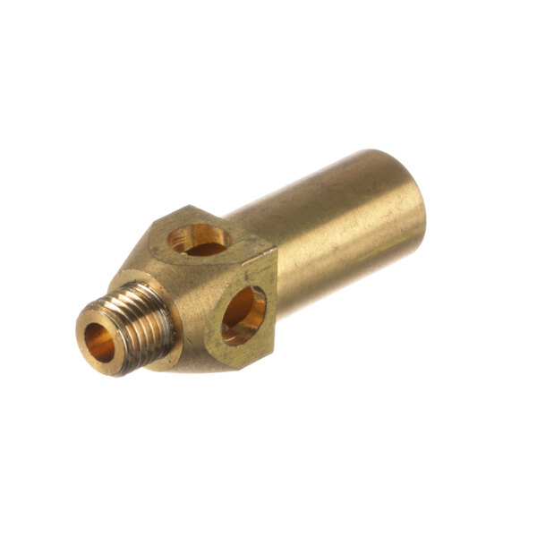 A close-up of a gold metal Imperial 1600 jet burner tip with holes.