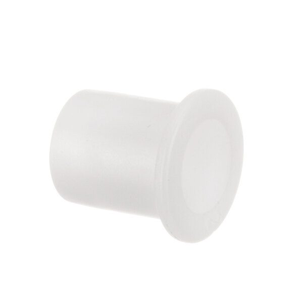 A close-up of a white plastic plug.