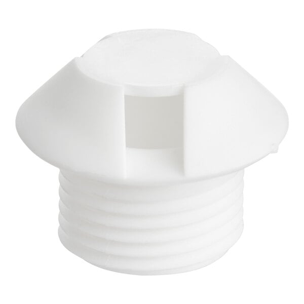 A close-up of a white plastic screw with a hole.