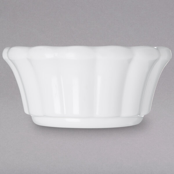 A white Carlisle scalloped ramekin.