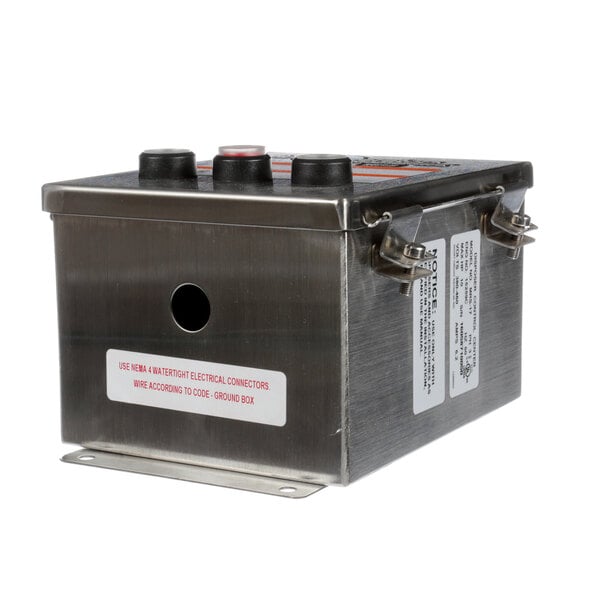 A metal InSinkErator control box with buttons and a label.
