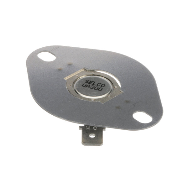 A circular metal Duke Hi Limit plate with black text and a small hole in it.