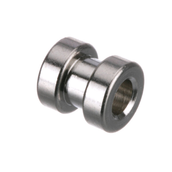 A close-up of a stainless steel threaded nut.