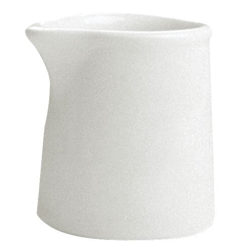 A white Hall China tankard creamer with a handle.