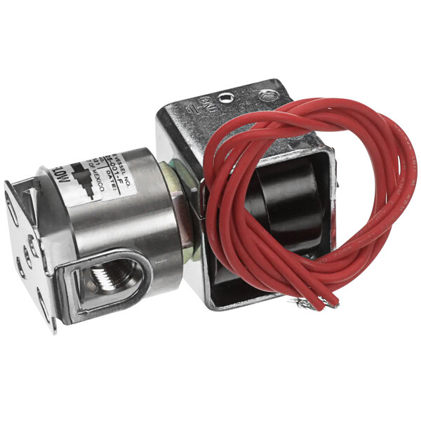 A close-up of a Crown Steam solenoid valve with a small red wire.