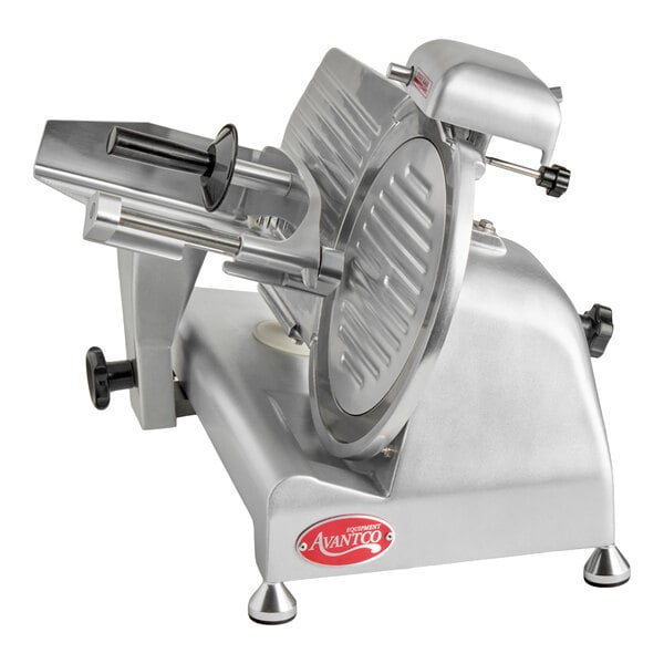 A metal meat slicer with a circular blade and adjustable thickness guide, featuring a handle and a sturdy base.