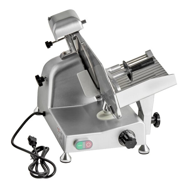 A silver electric meat slicer with a circular blade, adjustable thickness knob, and a power cord.