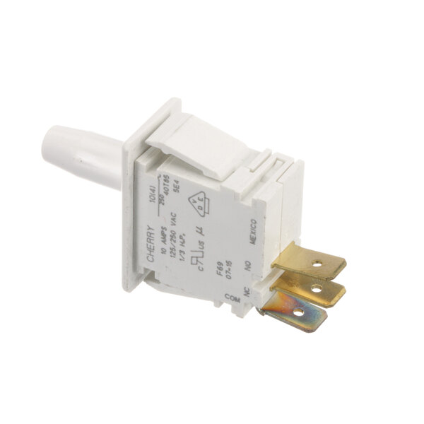 A close-up of a white Scotsman interlock switch with a yellow wire.