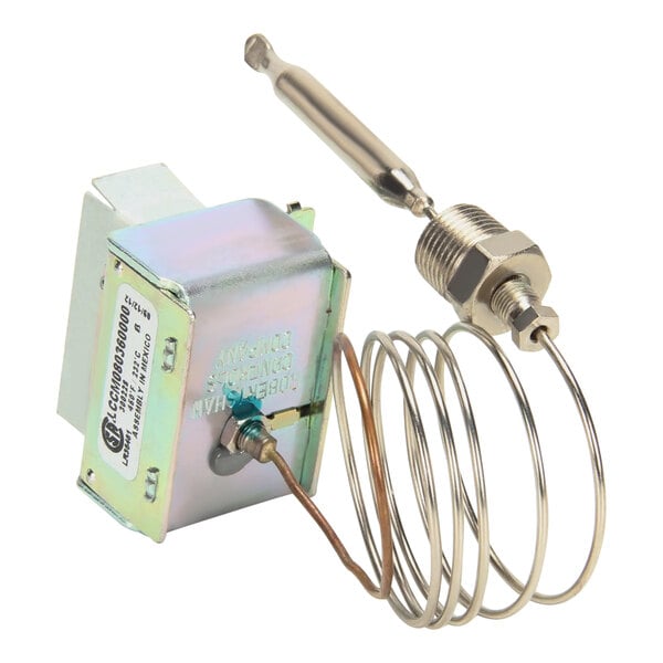 An APW Wyott Hi-Limit thermostat for a fryer, a small metal device with a spring.