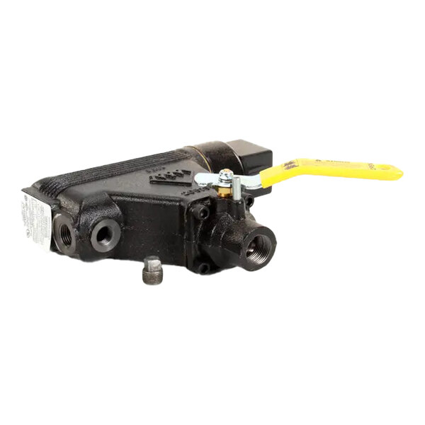 A black metal low water cut-off valve with a yellow handle, used for monitoring water levels in boilers.