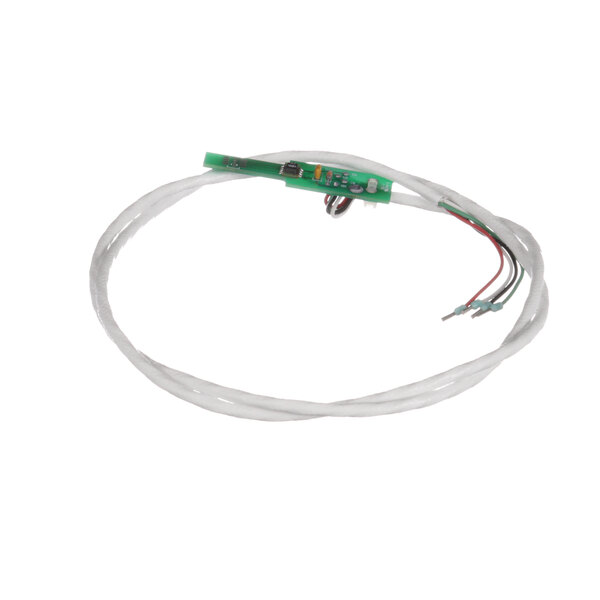 A white wire with a green connector on a Carter-Hoffmann humidity sensor.