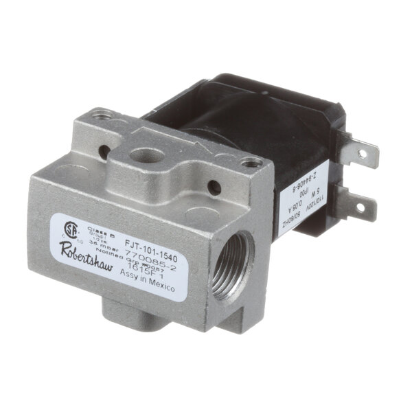 A close-up of a Vulcan solenoid gas valve with a black and silver label.