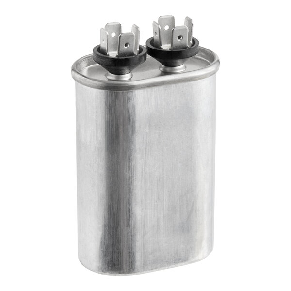 A metal capacitor with two terminal connectors on top, used for electrical applications.