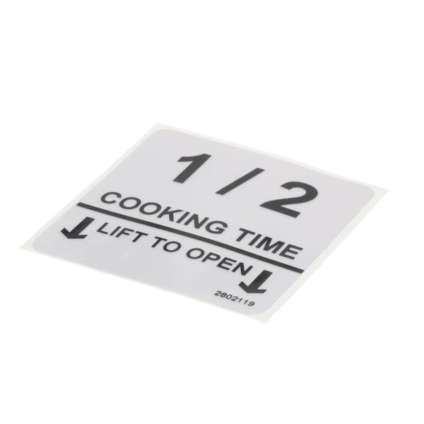 A white sign with black text that says "Lincoln 1/2 Cooktime"