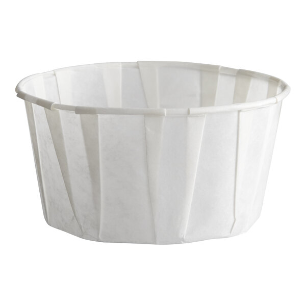 A white paper 5.5 oz. souffle or portion cup.